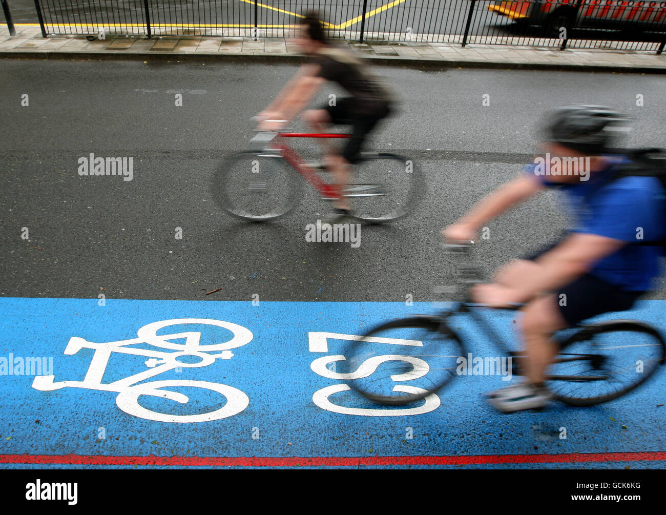 Cycle Superhighway - London. Cyclists rides on a cycle superhighway, in Kennington, central London Stock Photo