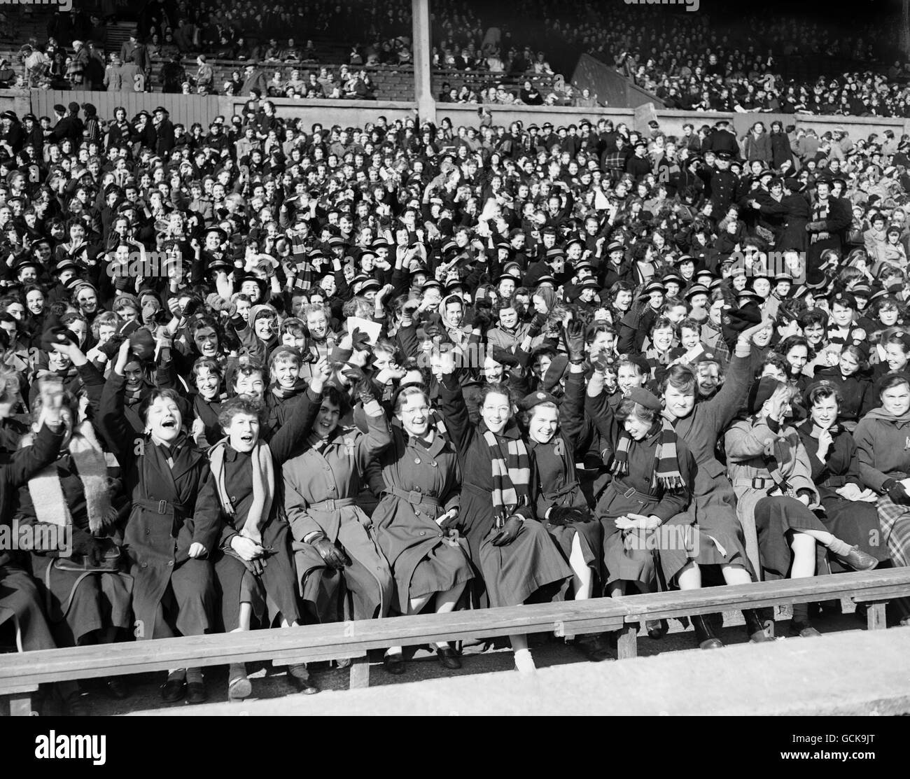 Hockey - Home Internationals - England v Wales - Wembley Stadium - 1955. Thousands of schoolchildren cheering during the All England Women's Hockey Association's International match between England and Wales. Stock Photo