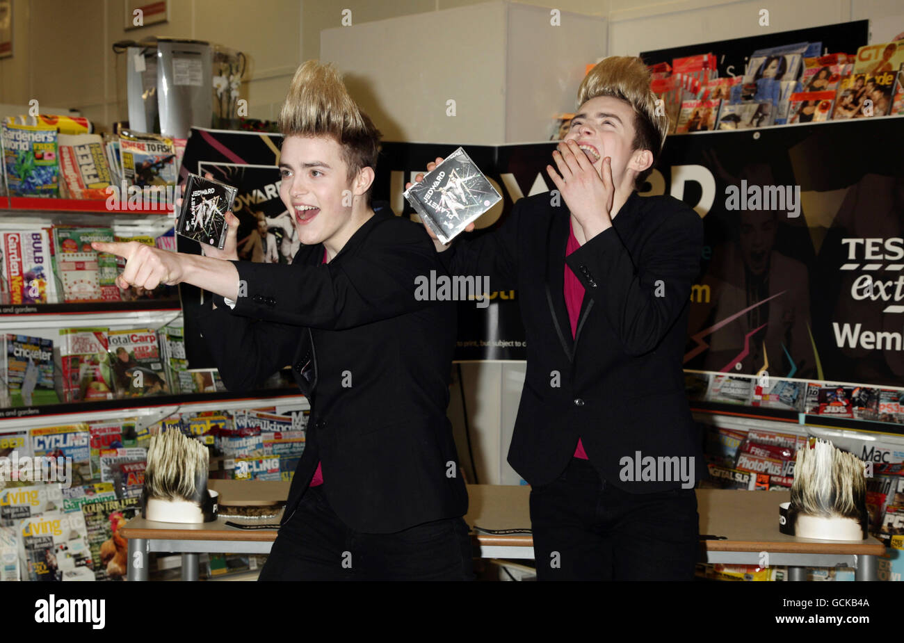 John and Edward (left) Grimes, better known as Jedward, during an instore signing for their album, at Tesco Extra in Brent Park, Wembley, north London. Stock Photo