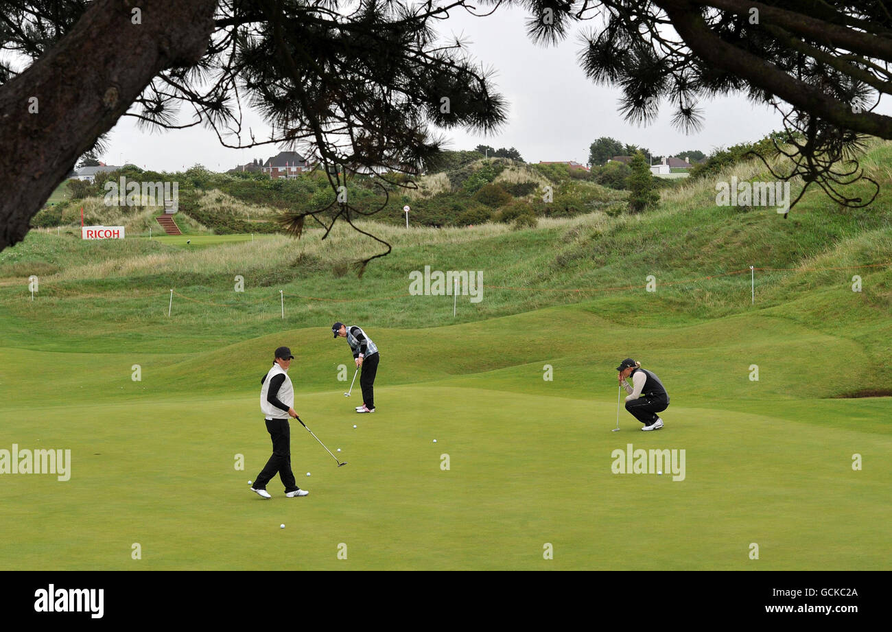 Catriona Matthew putts on the third green with Kelly Tidy (left) during the practice day at the Royal Birkdale Golf Club, Southport. Stock Photo