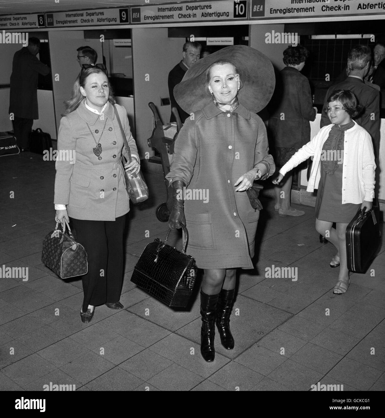 Actress Zsa Zsa Gabor at Heathrow Airport with her daughter Francesca Hilton, left. Stock Photo