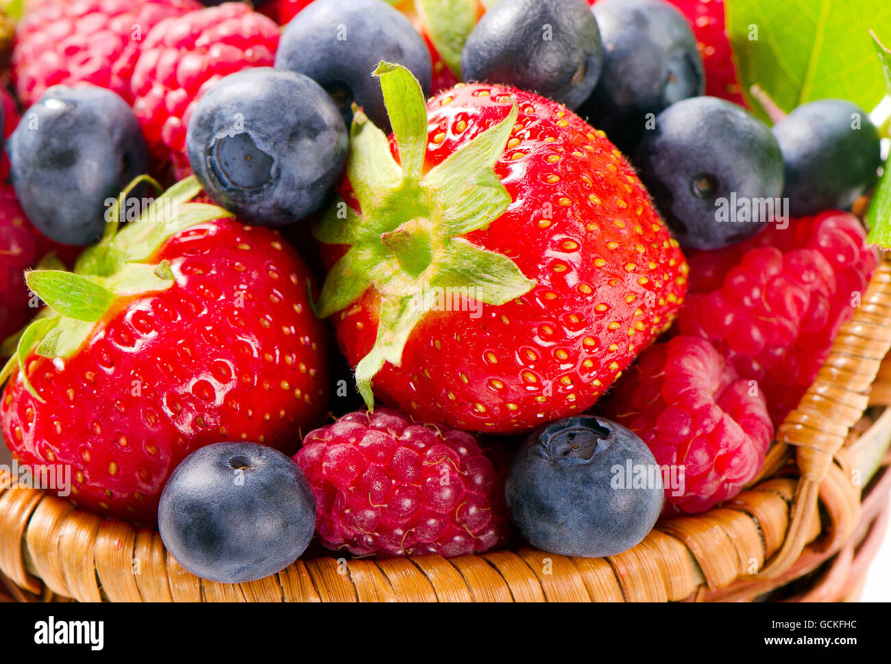 Fresh berries in a basket. Selective focus Stock Photo