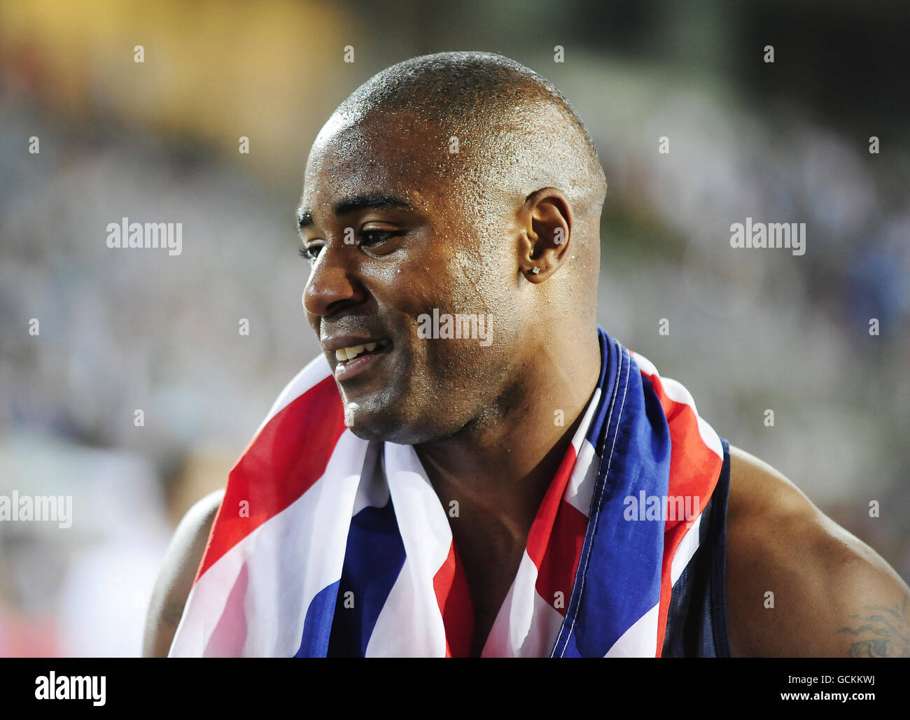 Great Britain's Mark Lewi Francis celebrates taking the Silver Medal in the Men's 100m Finals during day two of the European Championships at the Olympic Stadium in Barcelona, Spain. Stock Photo