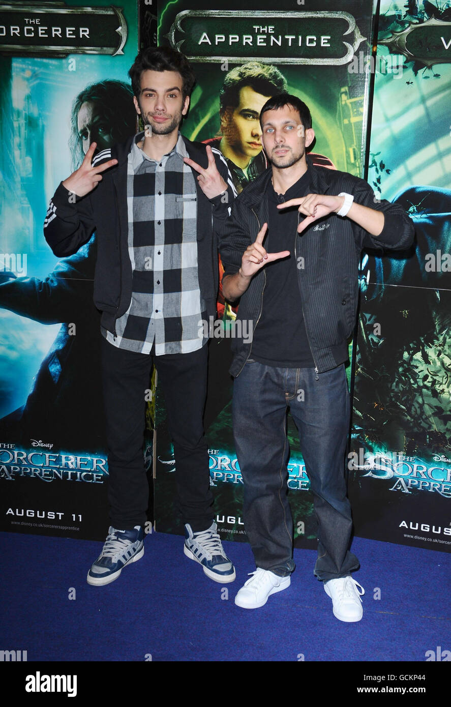 Jay Baruchel (left) and Dynamo arrive for the screening of The Sorcerer's Apprentice at the Cineworld Cinema on Haymarket in London. Stock Photo