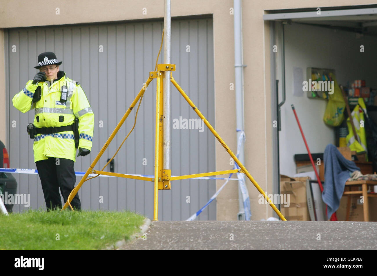 Police outside buildings on Slateford Road, Edinburgh, after three children were found dead in their home after emergency services were called out to reports of an explosion. Stock Photo