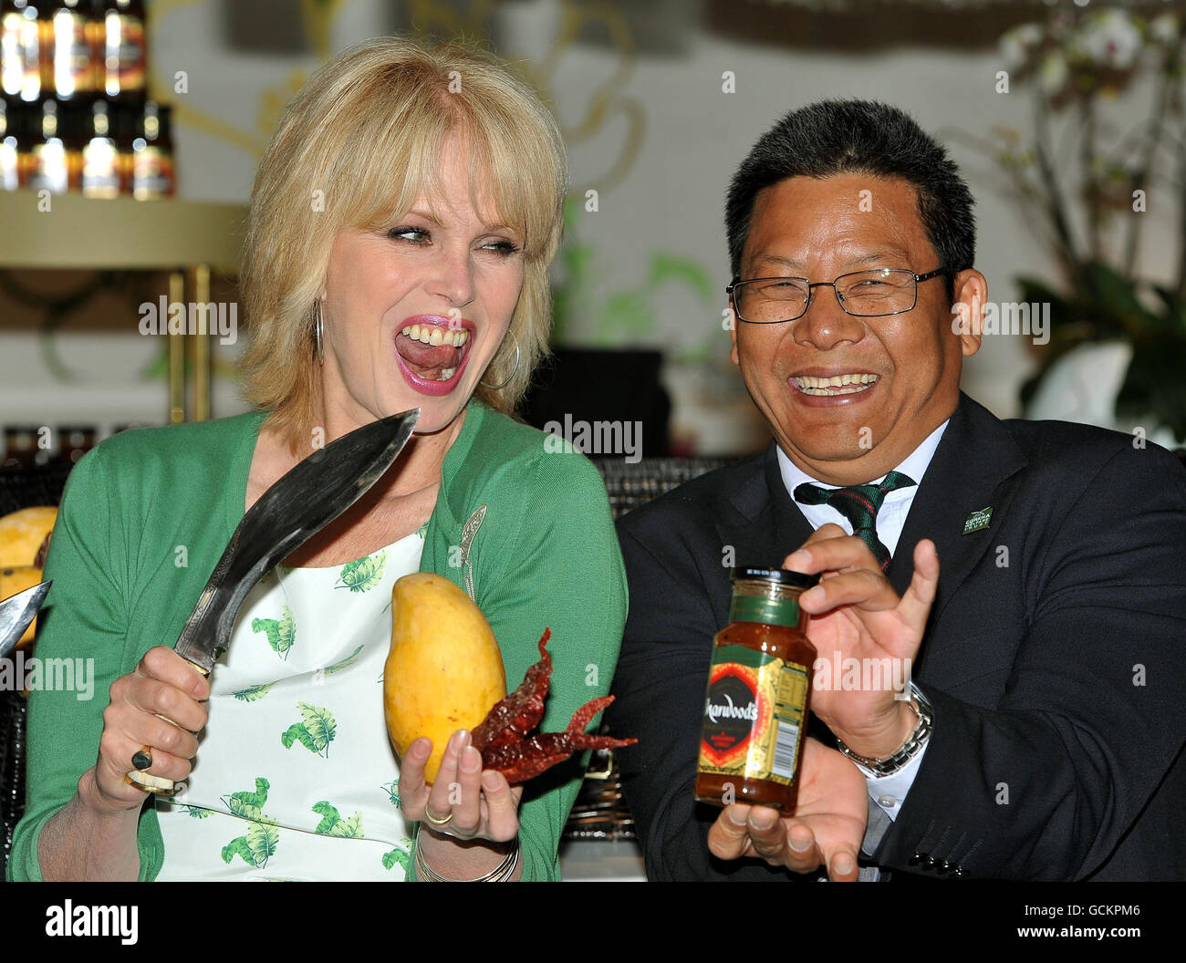 Joanna Lumley with Hum Bahadur Gurung and a jar of the new Sharwood's Mango and Kashmiri chutney that she is launching at the Harvey Nicholls store in central London. Stock Photo