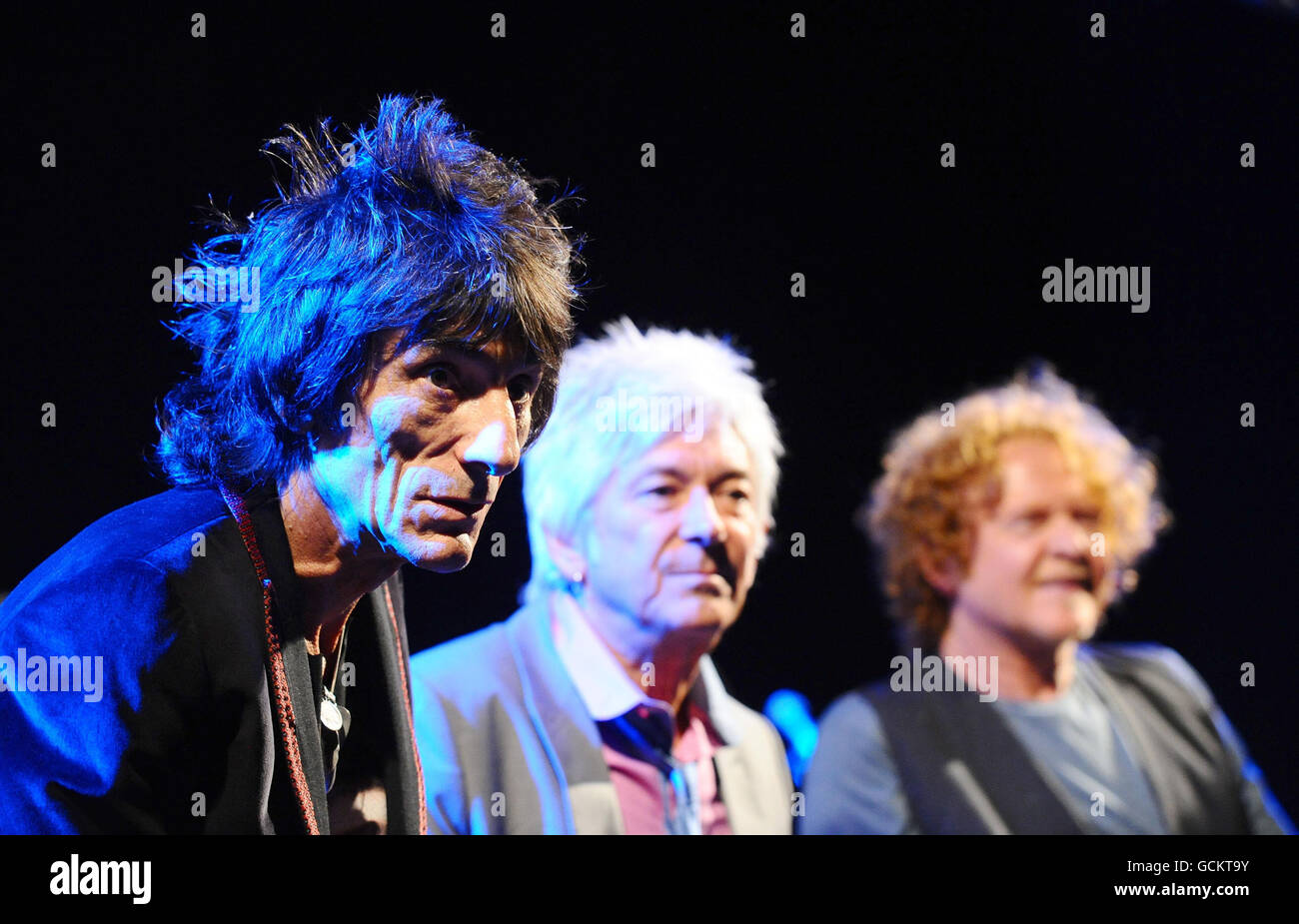 Members of the reformed Faces (left to right), Ronnie Wood, Ian McLagan and Simply  Red singer Mick Hucknall, standing in for Rod Stewart, during a Q&A session  before they perform an exclusive