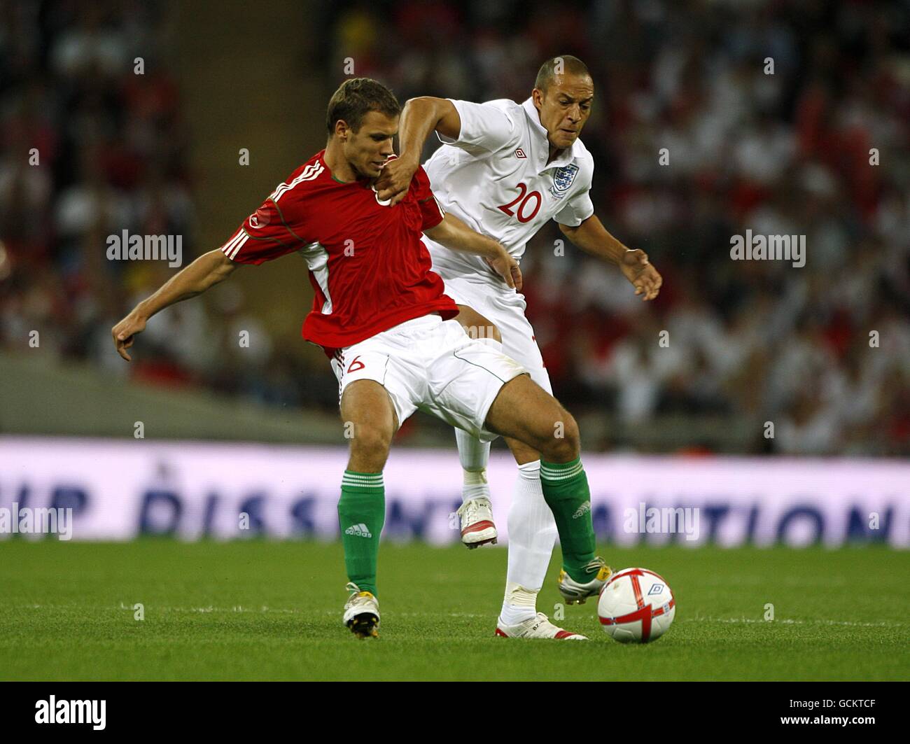 Soccer - International Friendly - England v Hungary - Wembley Stadium. England's Bobby Zamora (right) and Hungary's Krisztian Vadocz (left) battle for the ball Stock Photo