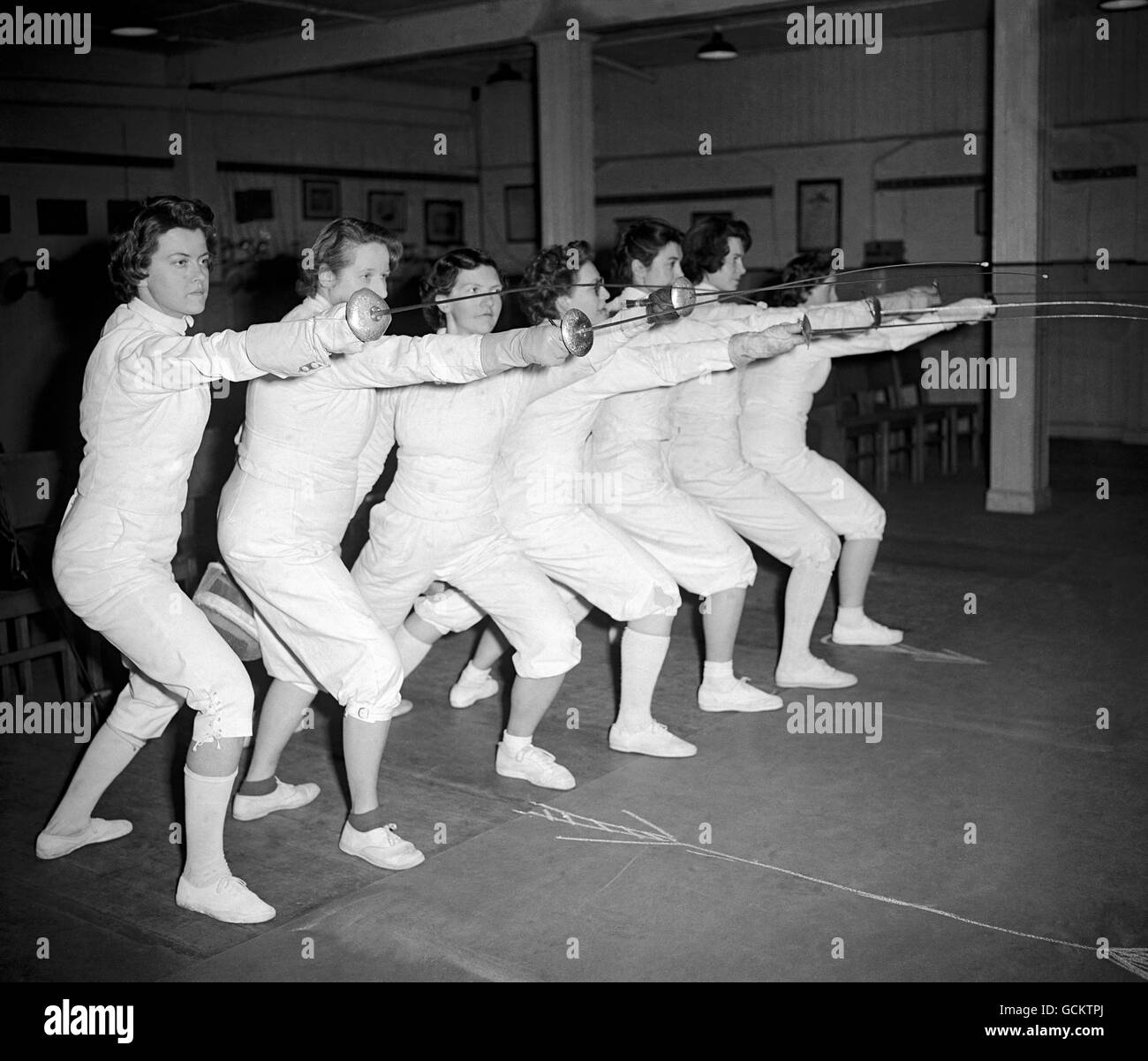 Ladies Foil Championship, at the ladies amateur fencing union headquarters in Hanover Square, London. In which Olympic gold medal winner Miss Gillian Sheen defends her title against an entry of 50. Among those who wish to relieve Miss Sheen of her title are (L-R) Miss R.Milward, Mrs. Hulbert, Miss P.Patient, Miss R.Gibbons, Miss S.Fleury, Mrs. Sellick and Miss G.Bater. Stock Photo
