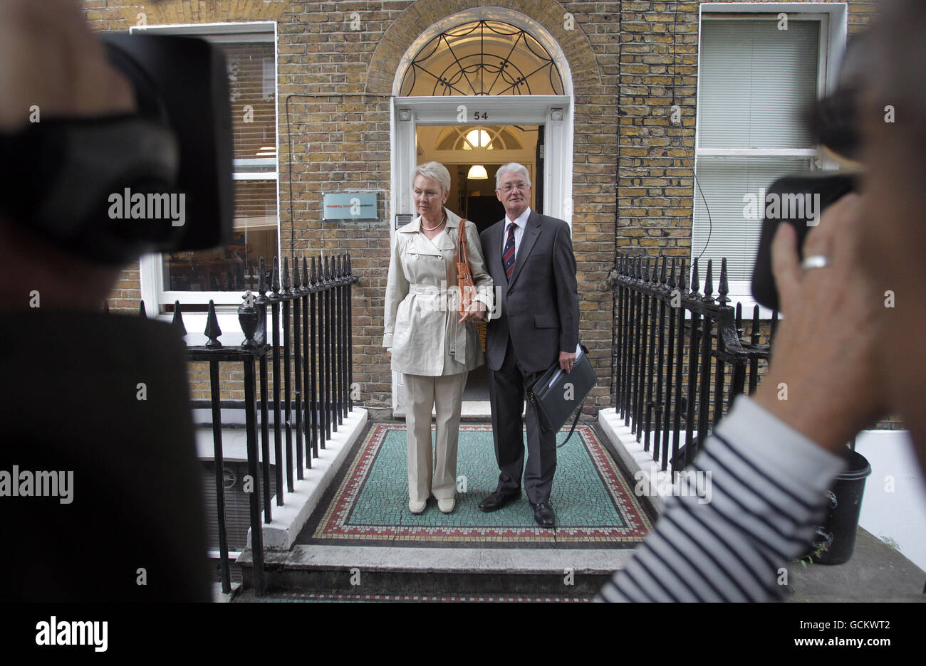 Retired British businessman Christopher Tappin, with his wife Elaine (left), addresses the media in central London. Stock Photo