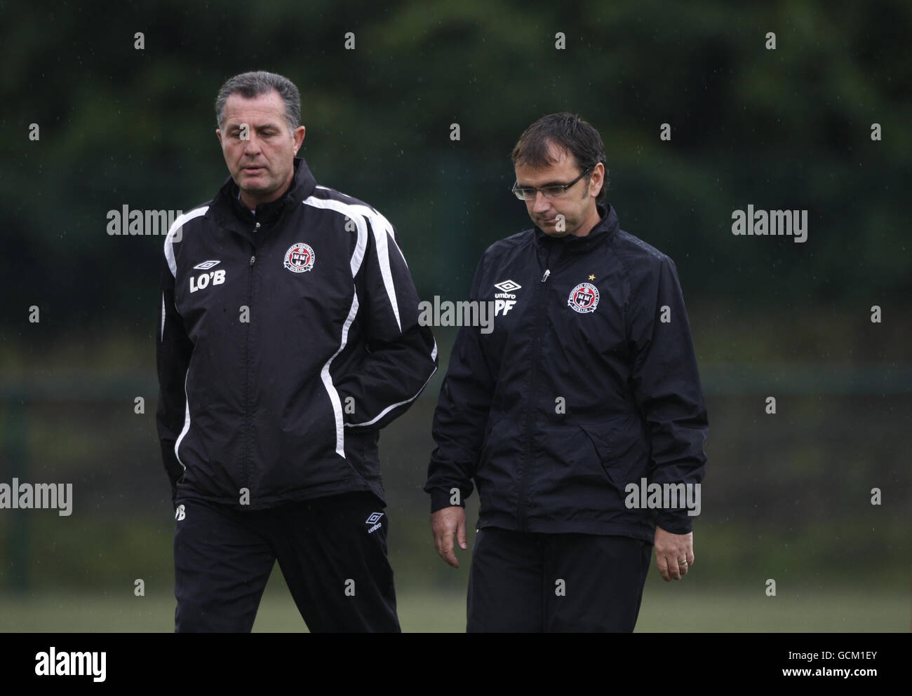 Bohemien FC Manager Pat Fenlon (right) and assistant manager Liam O'Brien shows their dejection during the Champions League Qualifier at Park Hall, Oswestry. Stock Photo