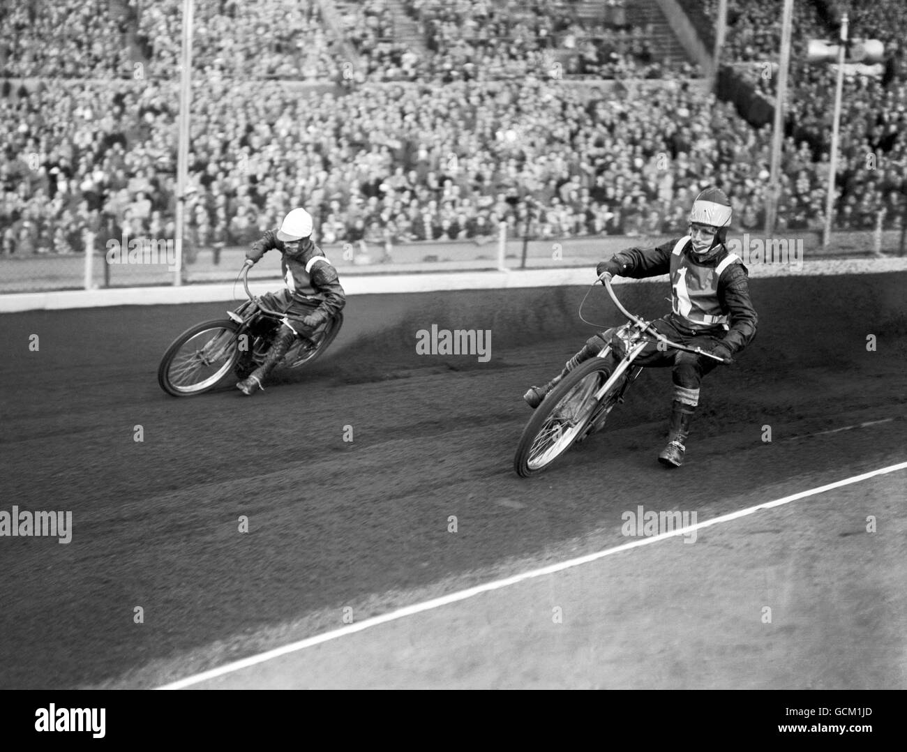 Speedway - First Test - England v Australia - Wembley Stadium. Aub Lawson, left, and Graham Warren, right, at speed. Stock Photo