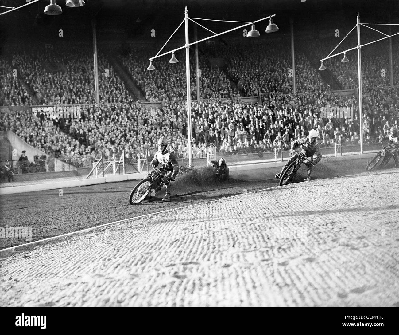 Speedway - Wembley Stadium. Speedway racing in progress at Wembley Stadium. Stock Photo