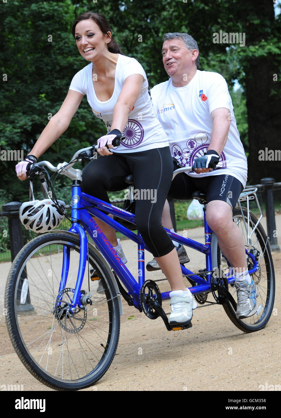 Miss England Lance Corporal Katrina Hodge and former England football manager Graham Taylor launch the annual Royal British Legion Pedal to Paris bike ride, on a tandem bicycle, in London. Stock Photo
