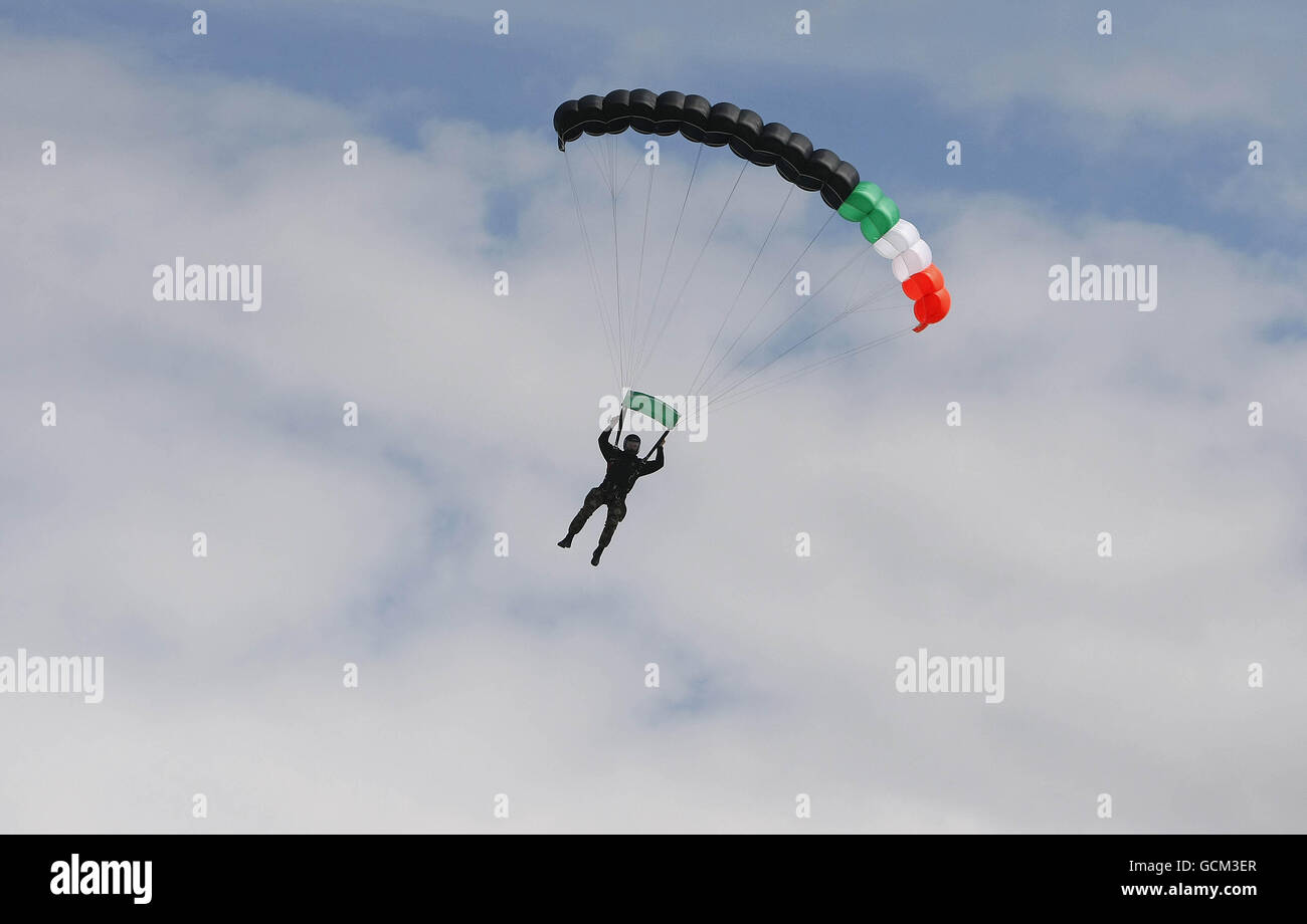 A member of the Irish Army Parachute Team the black knights takes part in a display during the commemoration of the 50th anniversary of the first deployment of Irish peacekeepers to the Congo at Casement Aerodrome, Baldonnel. Stock Photo