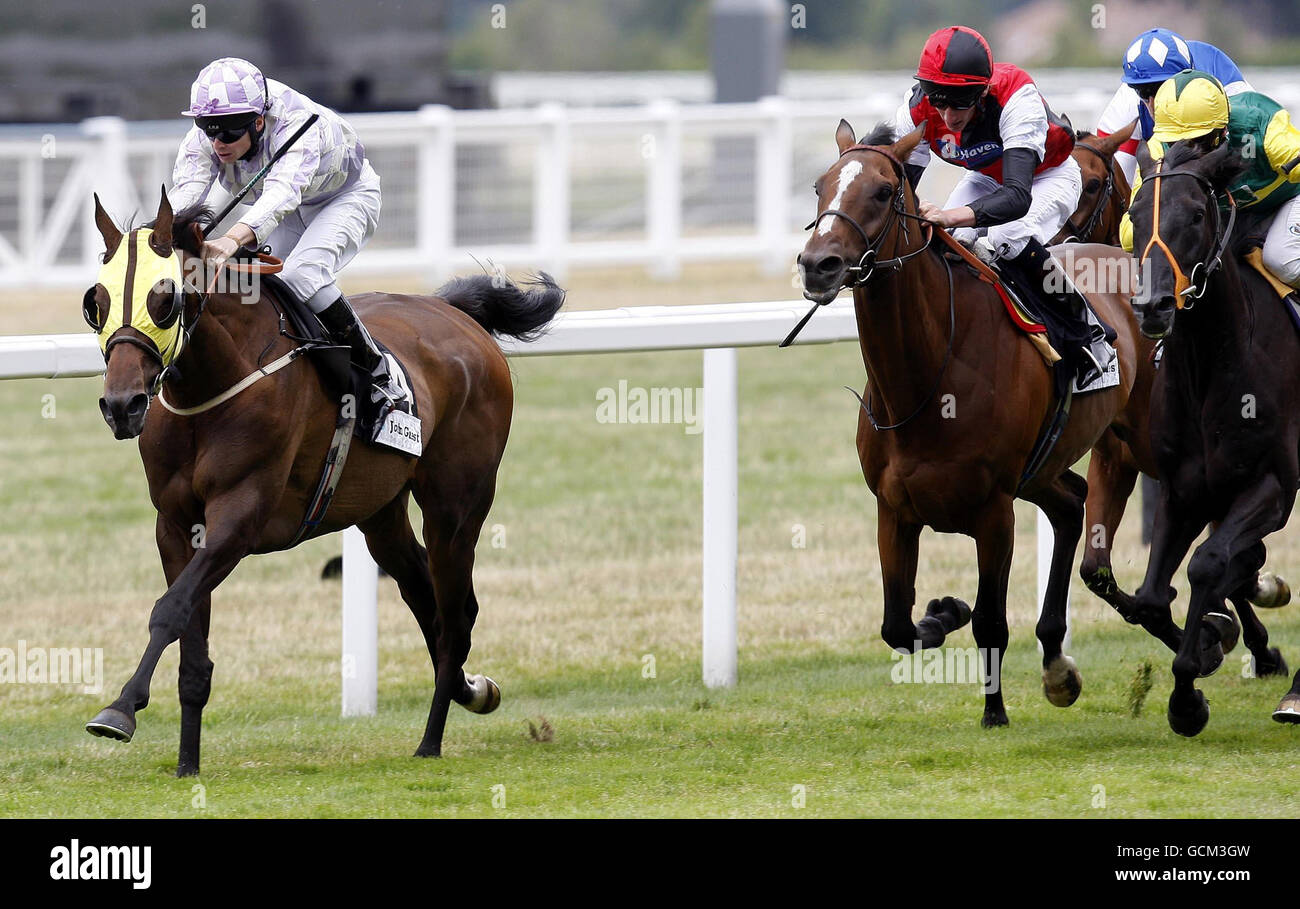 Horse Racing - Betfair Weekend Friday - Ascot Racecourse. Colloquial ridden by Fergus Sweeny (left) wins the John Guest brown jack stakes at Ascot Racecourse, Ascot. Stock Photo