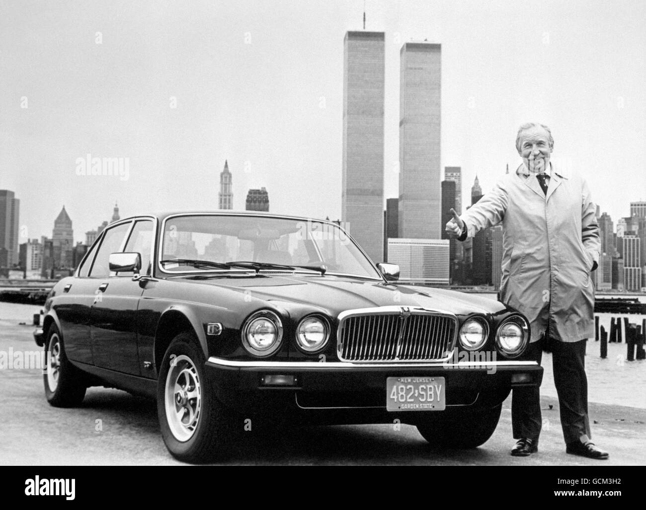 Graham Whitehead, president of British Leyland's American offshoot, in New York with a new Jaguar XJ6 Stock Photo