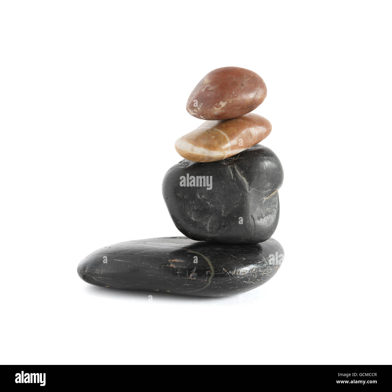 Balance concept. Abstract stack of stones on white background. Clipping path is included Stock Photo