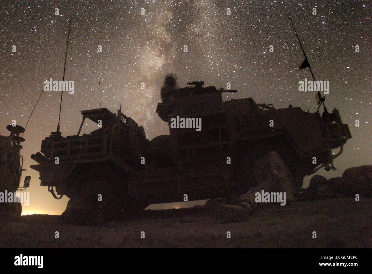 Scots Guards use a Jackal assault vehicle during an operation at an Afghan National Police base on Punjab hill, overlooking Babaji and Nahr-e-Saraj in the green zone next to the Helmand river in Helmand Province, Afghanistan. The Taliban regularly attack the hill and a large attack was expected so Scots Guards were deployed to provide protection. Stock Photo