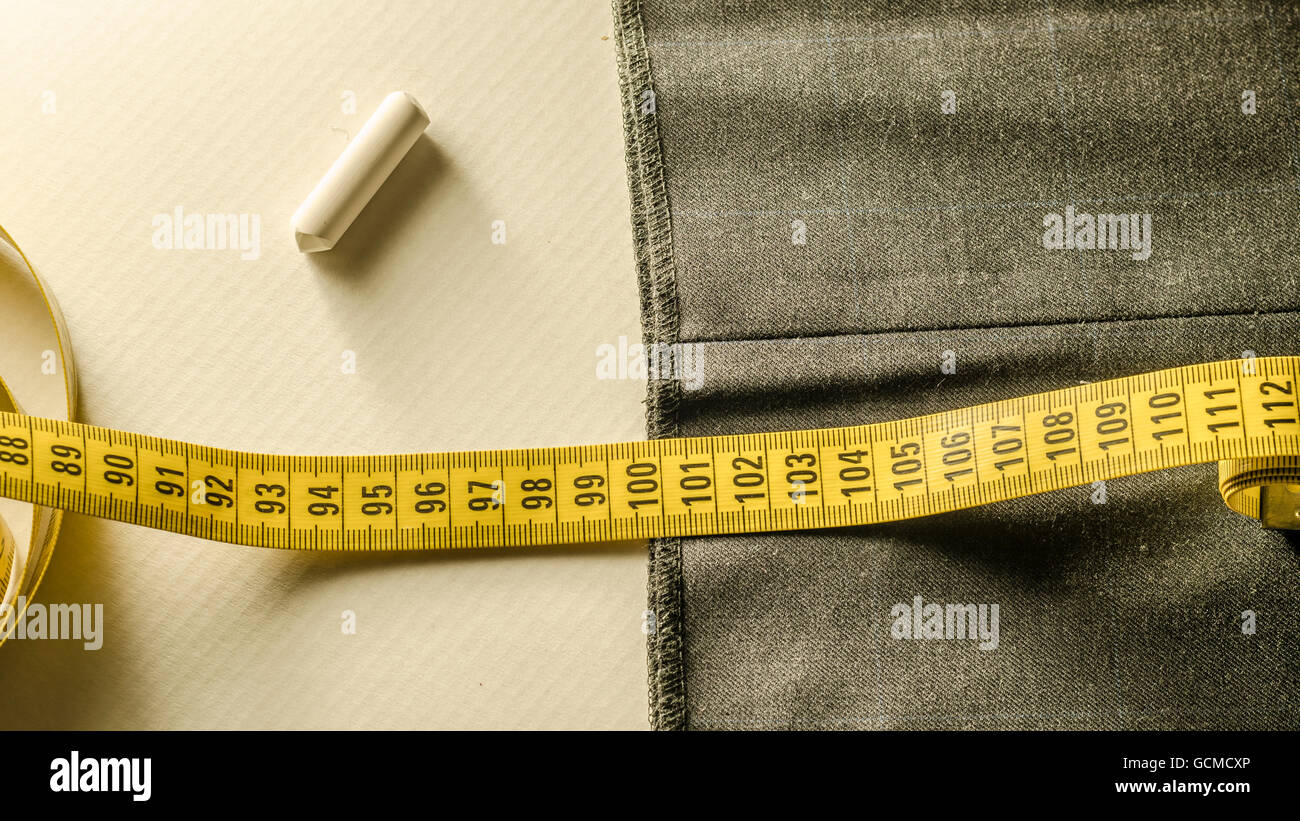still life with a tape measure a chalk and tissue Stock Photo Alamy
