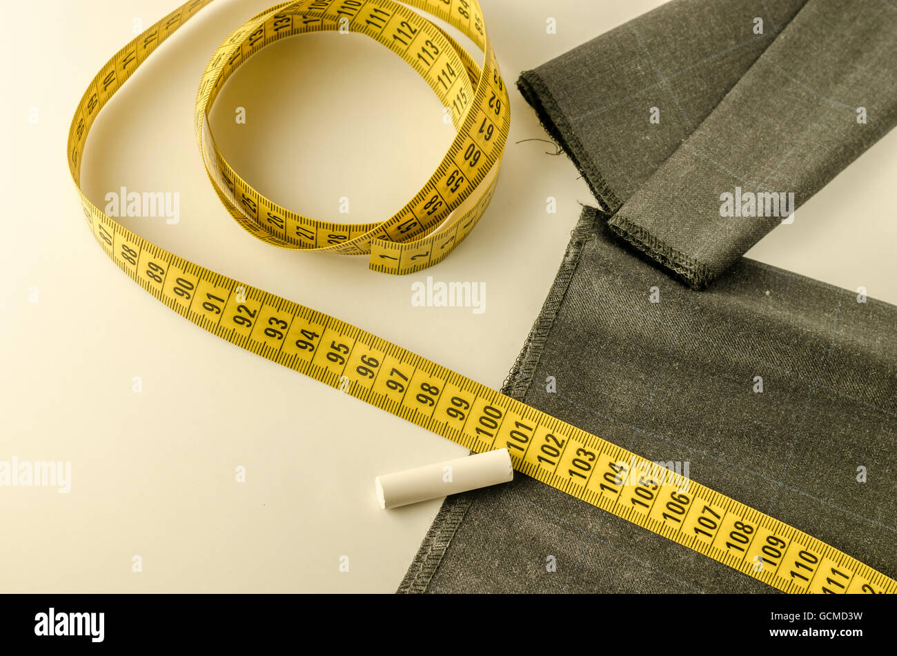 still life with a tape measure a chalk and tissue Stock Photo Alamy
