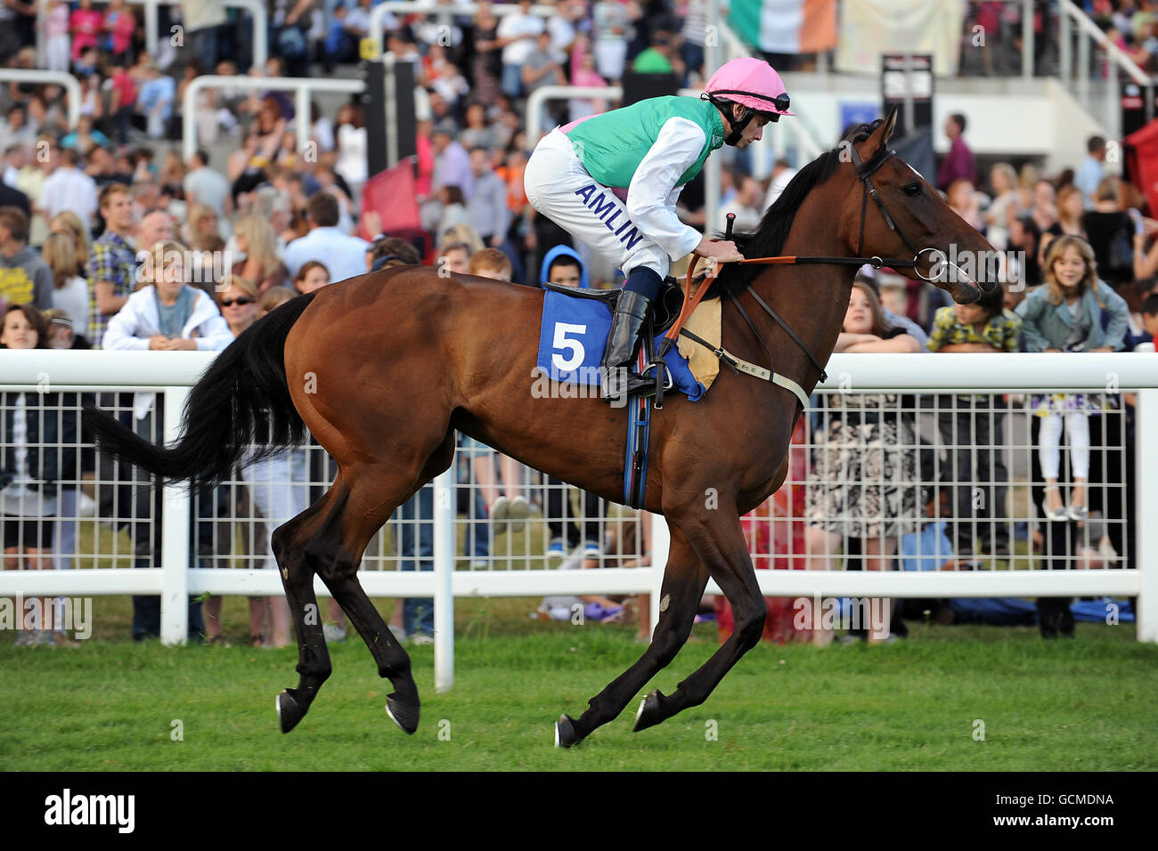 Horse Racing - Epsom Live! featuring JLS - Epsom Downs Racecourse. Mascarene ridden by jockey Ryan Moore going to post prior to the Brothers Pear Cider Maiden Fillies' Stakes Stock Photo
