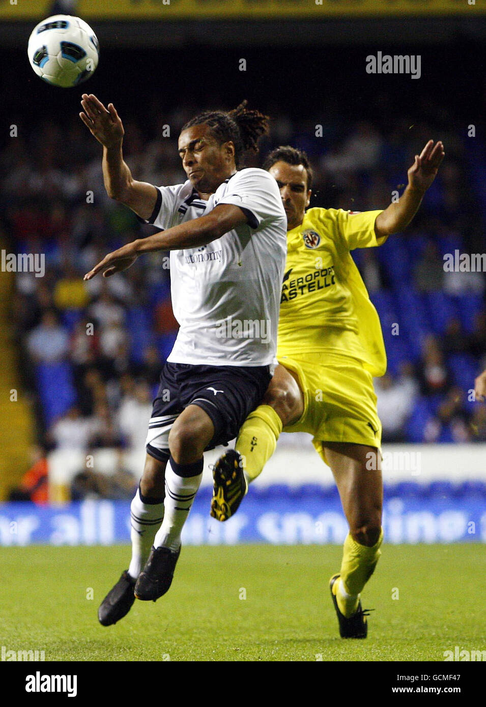 Tottenham Hotspurs' Giovani Dos Santos (left) and Villareal's Angel Lopez during the Pre Season Friendly at White Hart Lane, London. Stock Photo