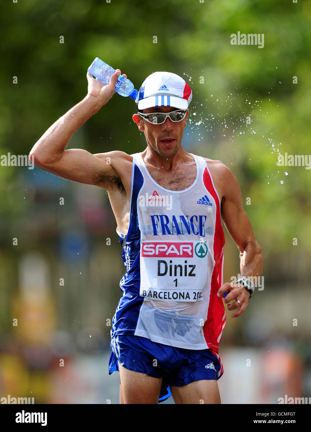 Athletics - IAAF European Championships 2010 - Day Four - Olympic Stadium. France's Yohann Diniz cools himself off during his win in the Men's 50km Walk Stock Photo