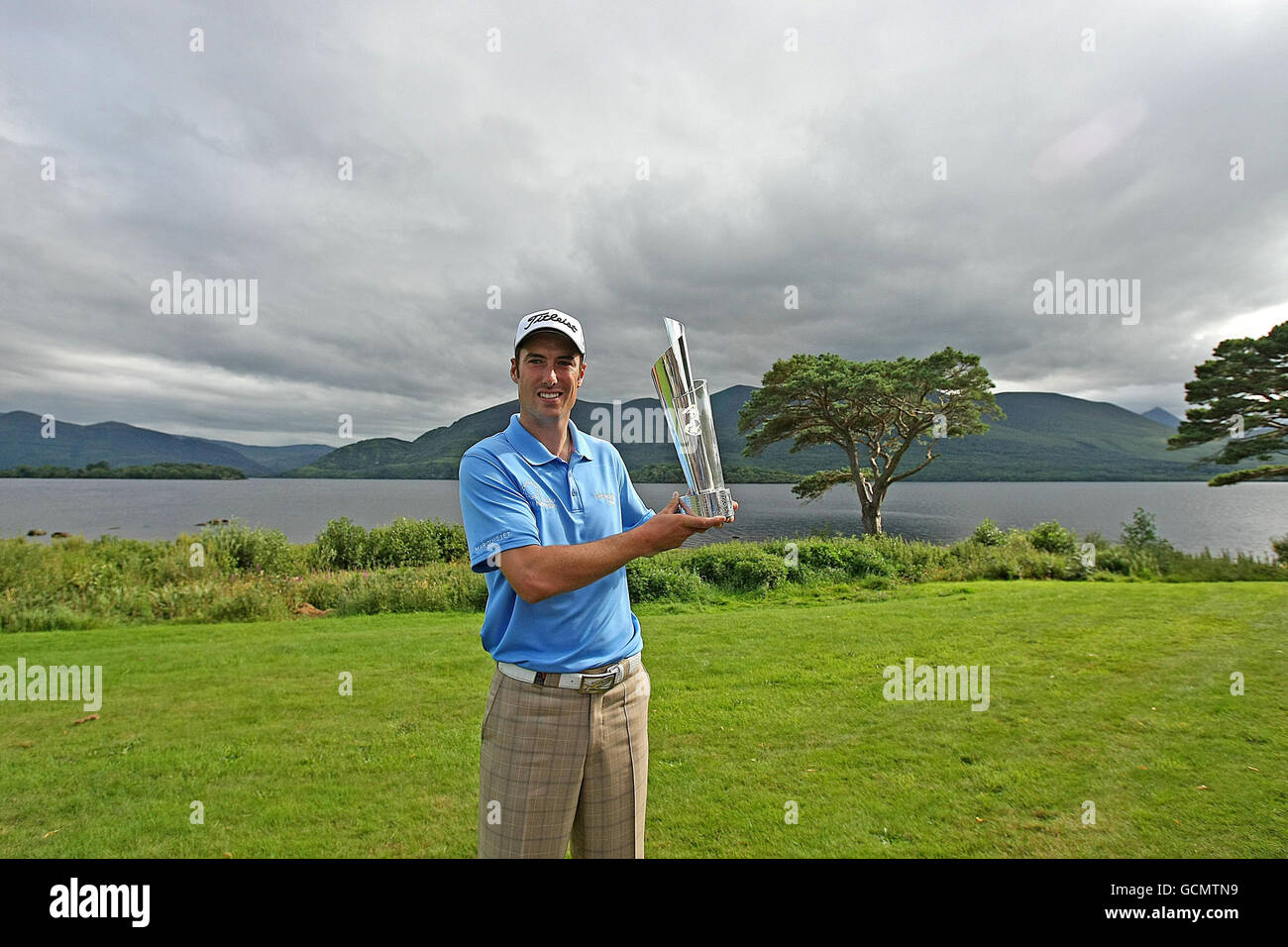 Golf killarney half length mid smiling trophy mangis hires stock