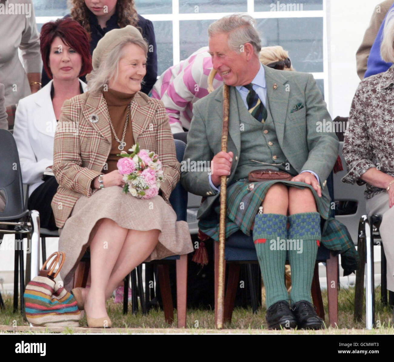 The Prince of Wales watches the Mey games with Lady Thurso (left) in Sutherland, Scotland. Stock Photo