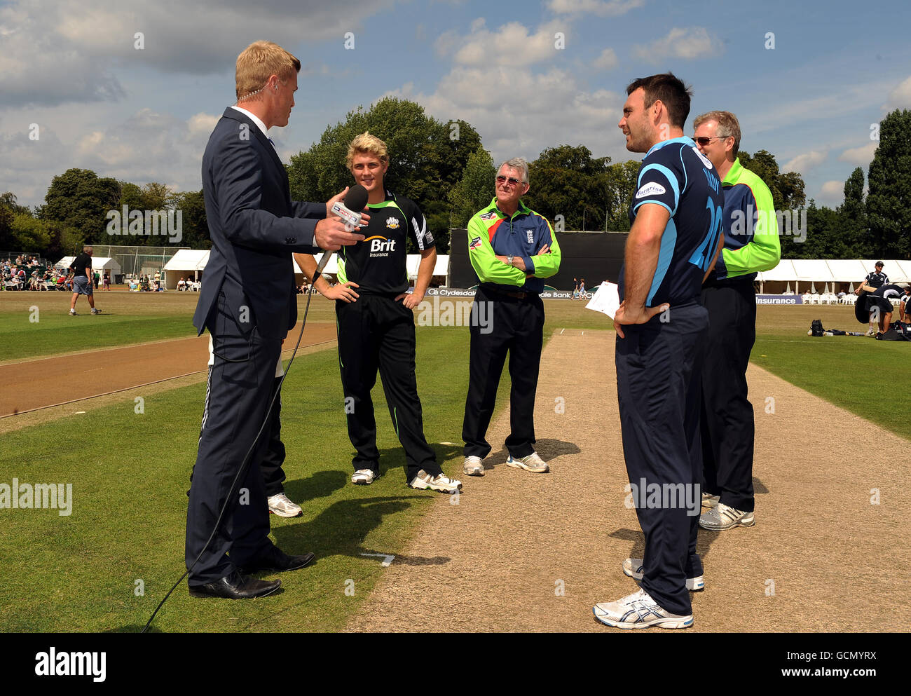 A Skysports presenter talks with Surrey's Rory Hamilton-Brown (2nd left) and Sussex's Michael Yardy (2nd right) Stock Photo