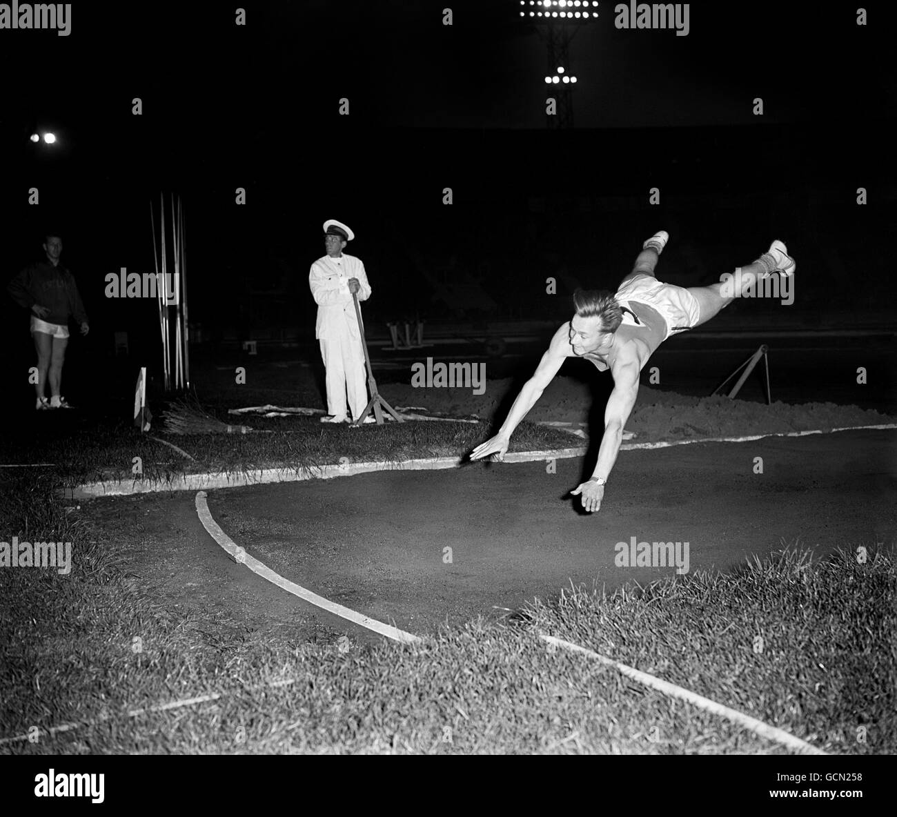 M.Paananen of Finland, winner of the Javelin almost does a handstand at the end of this throw. Stock Photo