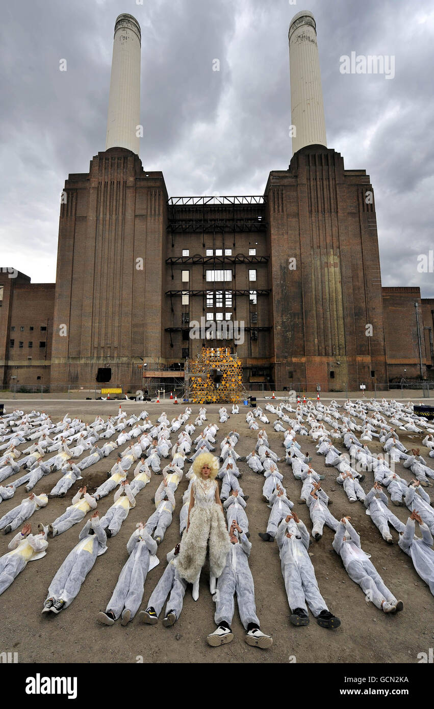 Around 500 actors for The National Youth Theatre of Great Britain perform S'Warm at Battersea Power Station in London to raise awareness of the alleged global environmental crisis caused by dwindling bee populations. Stock Photo