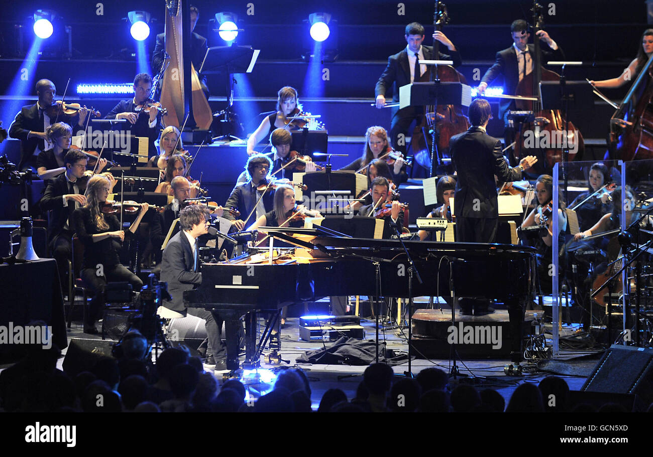 Jamie Cullum performs with the Heritage Orchestra at the Royal Albert Hall for BBC Late Night Proms. Stock Photo