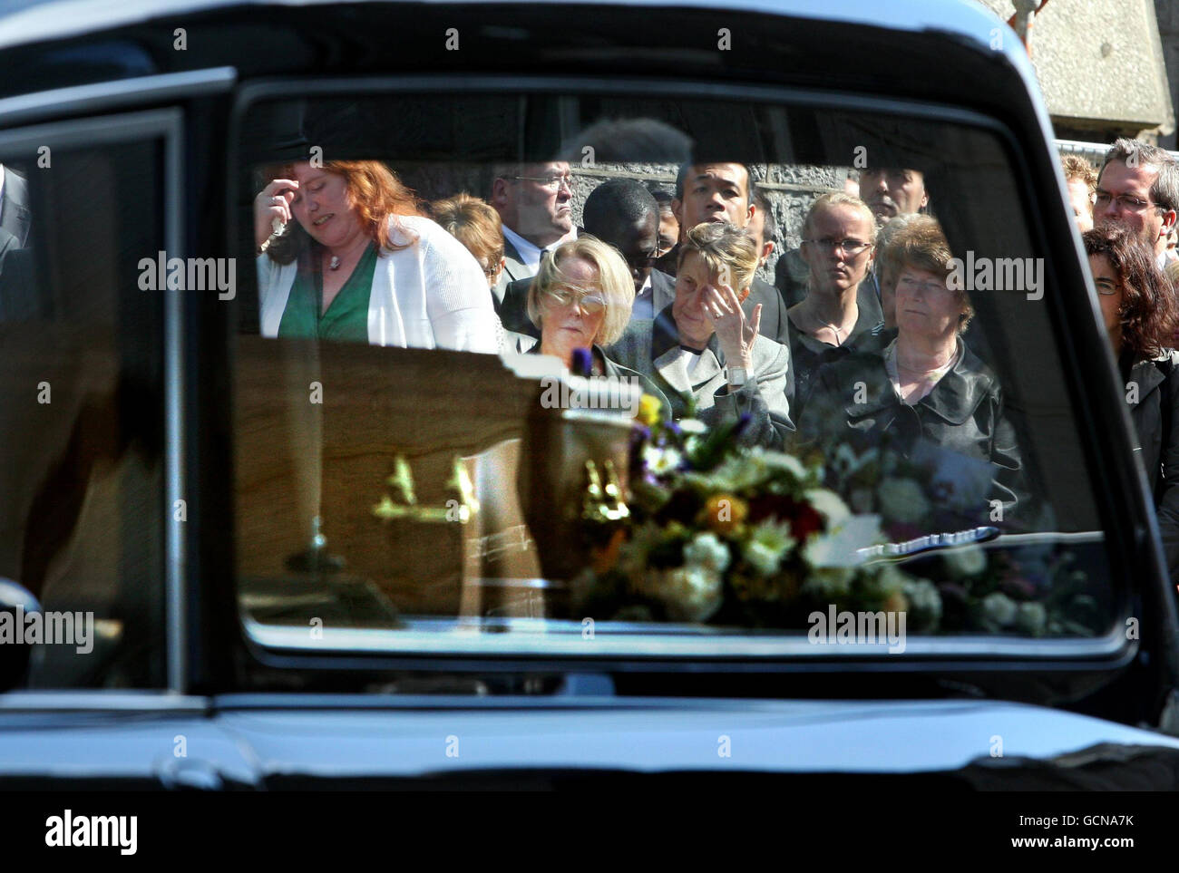 Mourners Watch The Coffins Of Austin Luke And Cecilia Riggi As They Are Placed Into Hearses After Their Funeral At St Mary S Cathedral In Aberdeen Stock Photo Alamy