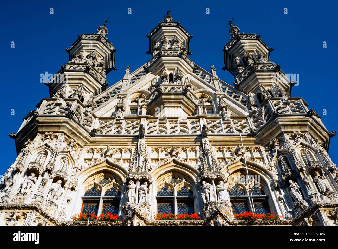The Gothic town hall in Brabantine Late Gothic style at the Grote Markt / Main Market square, Leuven / Louvain, Belgium. Leuven Stock Photo