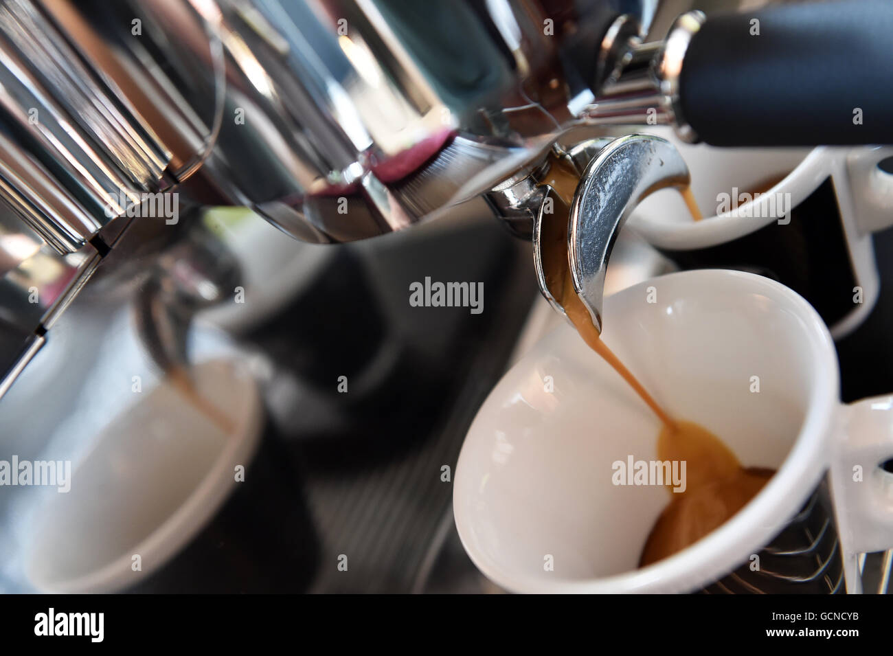 Espresso coffee maker barista style Stock Photo Alamy