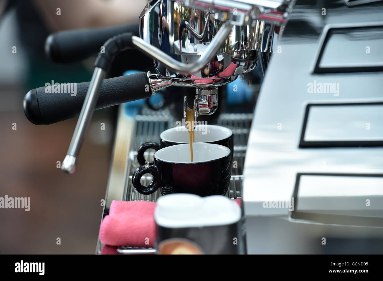 Espresso coffee maker barista style Stock Photo Alamy