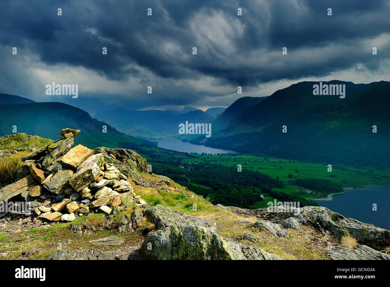 Dark storm clouds over the fells Stock Photo - Alamy