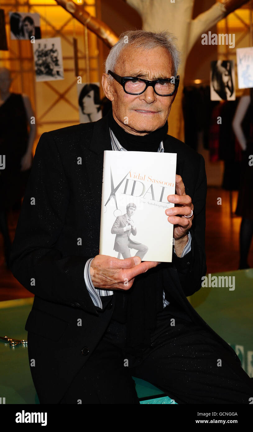 Vidal Sassoon with a copy of his new book Vidal: The Life and Career of a Style Icon, at Selfridges, as part of British Vogue's Fashion's Night Out, in London. Stock Photo
