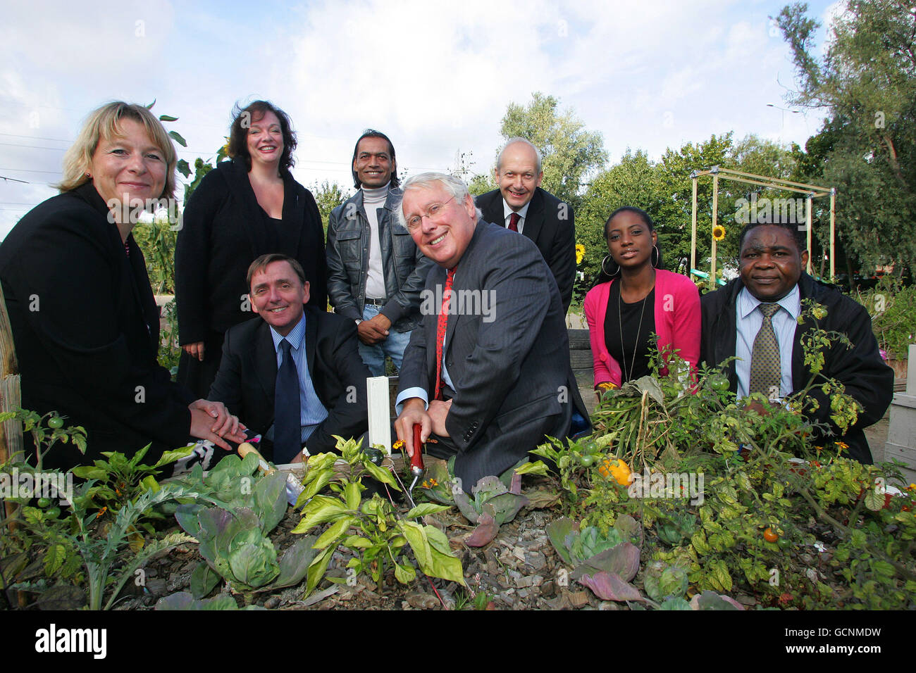 Communities Minister Bob Neill MP (centre), Helen Rainsford of ...