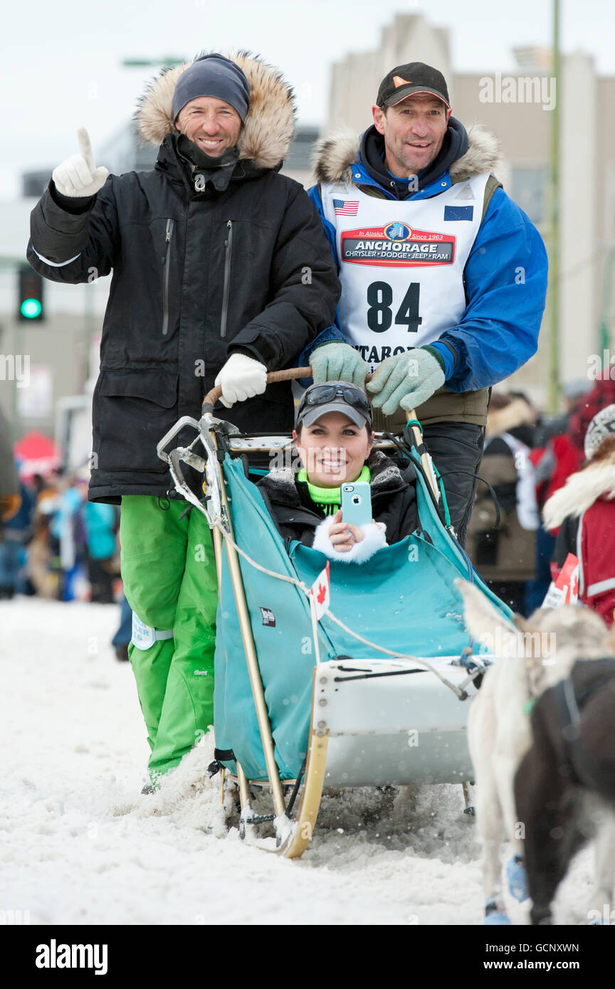 Hans Gatt and team leave the ceremonial start line with an Iditarider during the 2016 Iditarod Stock Photo