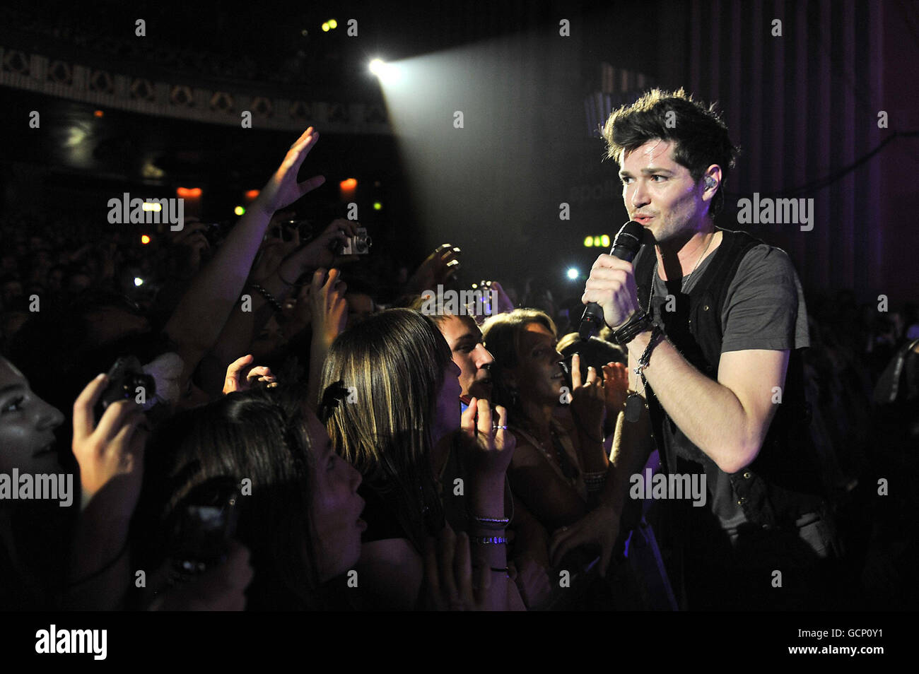 The Script in concert - London. Danny O'Donoghue of The Script performing at the Hammersmith Apollo in west London. Stock Photo