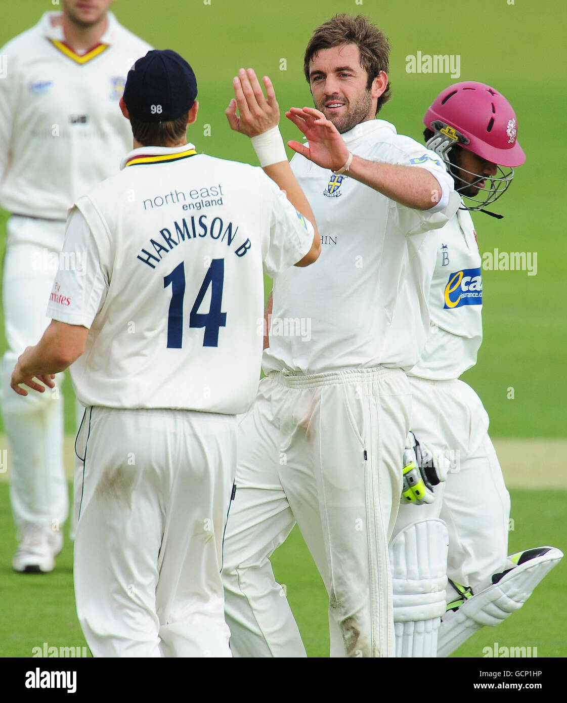 Durham's Liam Plunkett celebrates with Ben Harmison after taking the wicket of Somerset's Arul Suppiah during the LV County Championship match at the Emirates Durham International Cricket Ground, Durham. Stock Photo