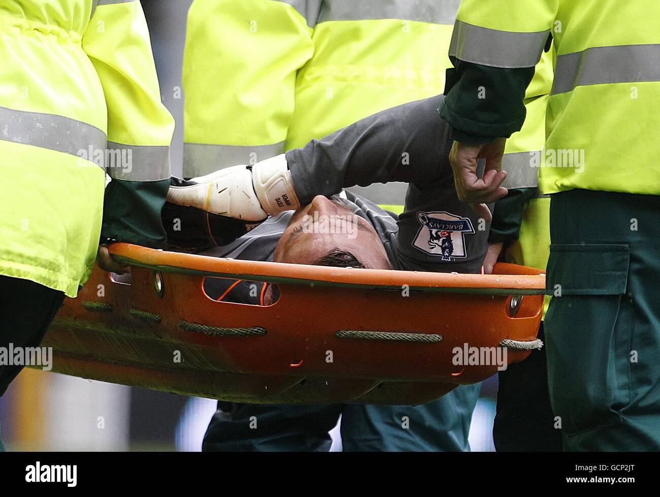 Newcastle United goalkeeper Steve Harper is stretchered off injured ...