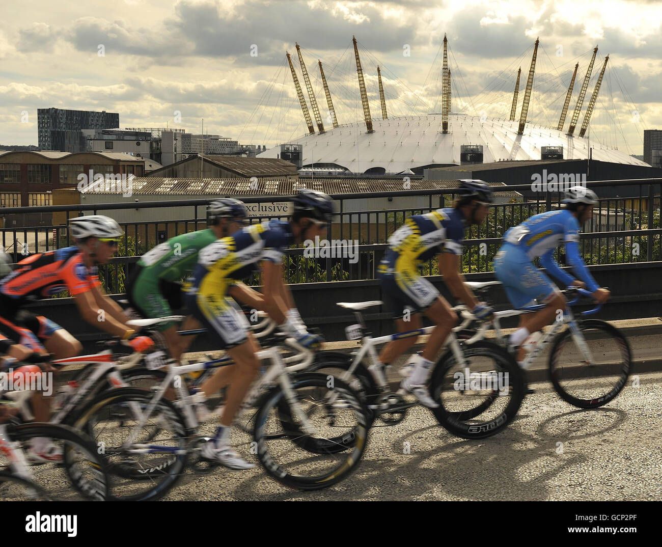 Cycling - 2010 Tour of Britain - Stage 8 - London. Riders pass through London's Docklands overlooking the O2 during stage 8 of of the Tour of Britain in London. Stock Photo