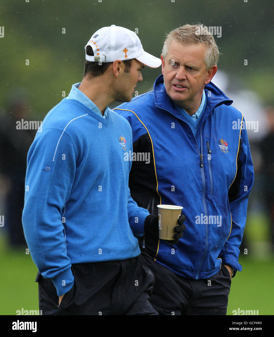 European Captain Colin Montgomerie (right) speaks with Martin Kaymer during a practice round at Celtic Manor, Newport. Stock Photo
