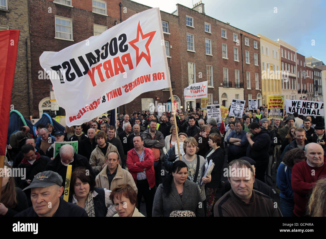 Irish Trade Unions protest against cutbacks and bailouts for banks, outside Leinster House in Dublin. Stock Photo