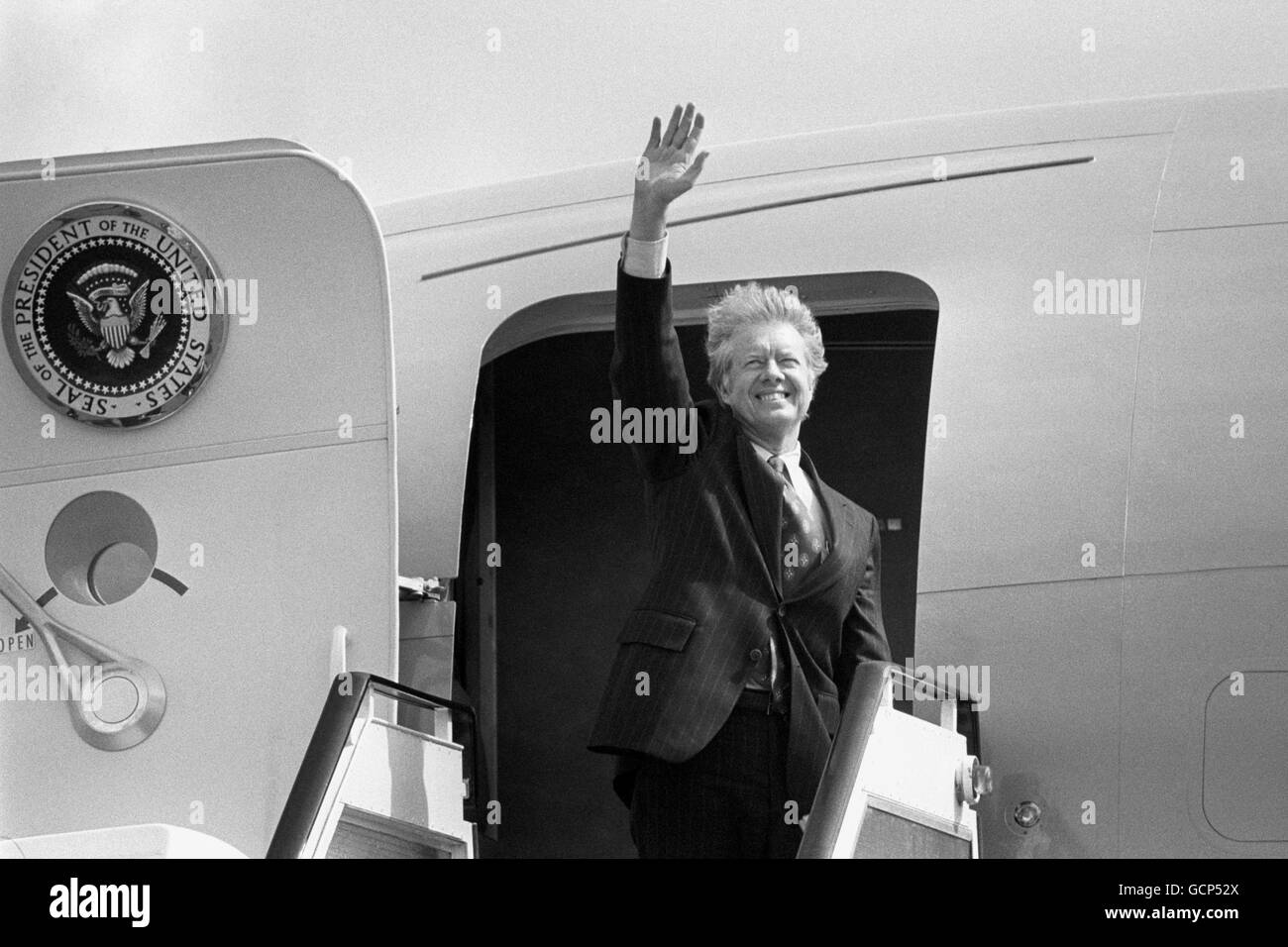 President Jimmy Carter on his first foreign trip since becoming President of the United States, waves his farewell as he leaves Newcastle Airport to fly back to London after spending a day in the north east. Stock Photo