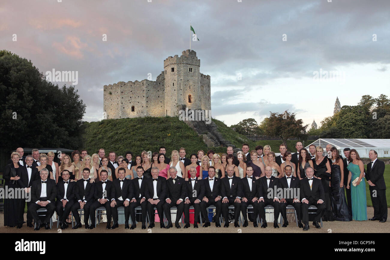 The Prince of Wales poses for a group photograph with the European and American Ryder Cup teams, accompanied by their wives and girlfriends at the Welcome to Wales 2010 Ryder Cup dinner at Cardiff Castle, Cardiff, south Wales, ahead of the Ryder Cup. Stock Photo